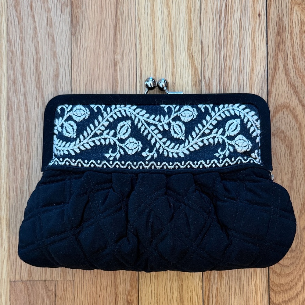 Quilted black and white Vera Bradley clutch.